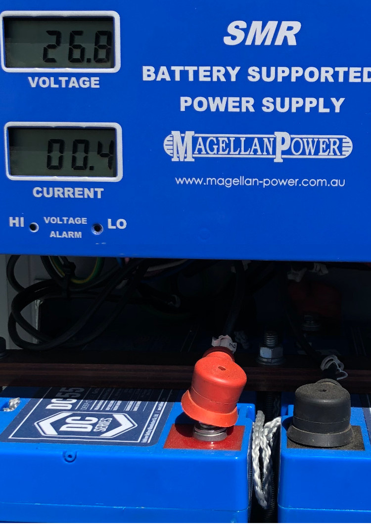 Logging DC power supply output voltages for a high voltage maintenance audit