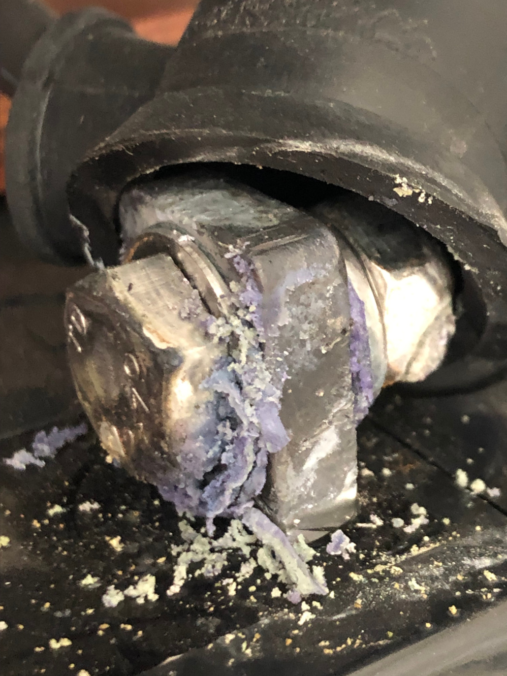 Corroded battery backup terminal connection for a high voltage maintenance audit
